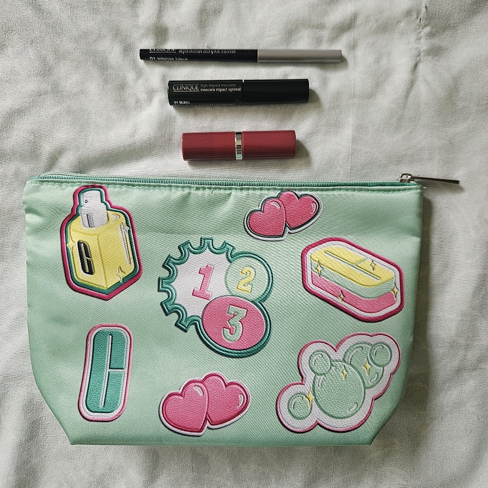 Clinique Bundle - 4 Pieces - Makeup Bag, Lipstick, Mascara, & Eyeliner